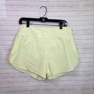 Athleta Women's Athletic Shorts in Light Yellow. Sz M. Run with it.